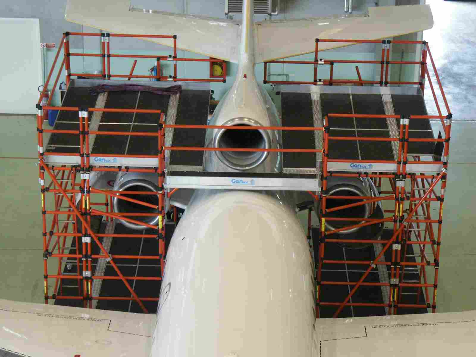 Front view of a large jet engine intake on an aircraft.